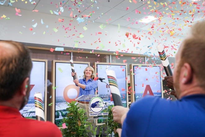 Electric vehicles, Toyota Kentucky President Susan Elkington celebrates with employees after announcing the facility with assemble Toyota first Battery Electric Vehicle in U.S. Toyota Motor.